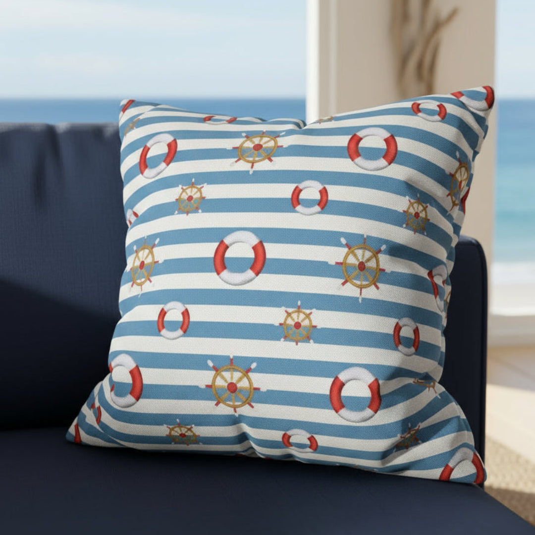 Decorative pillow with nautical pattern on a gray couch