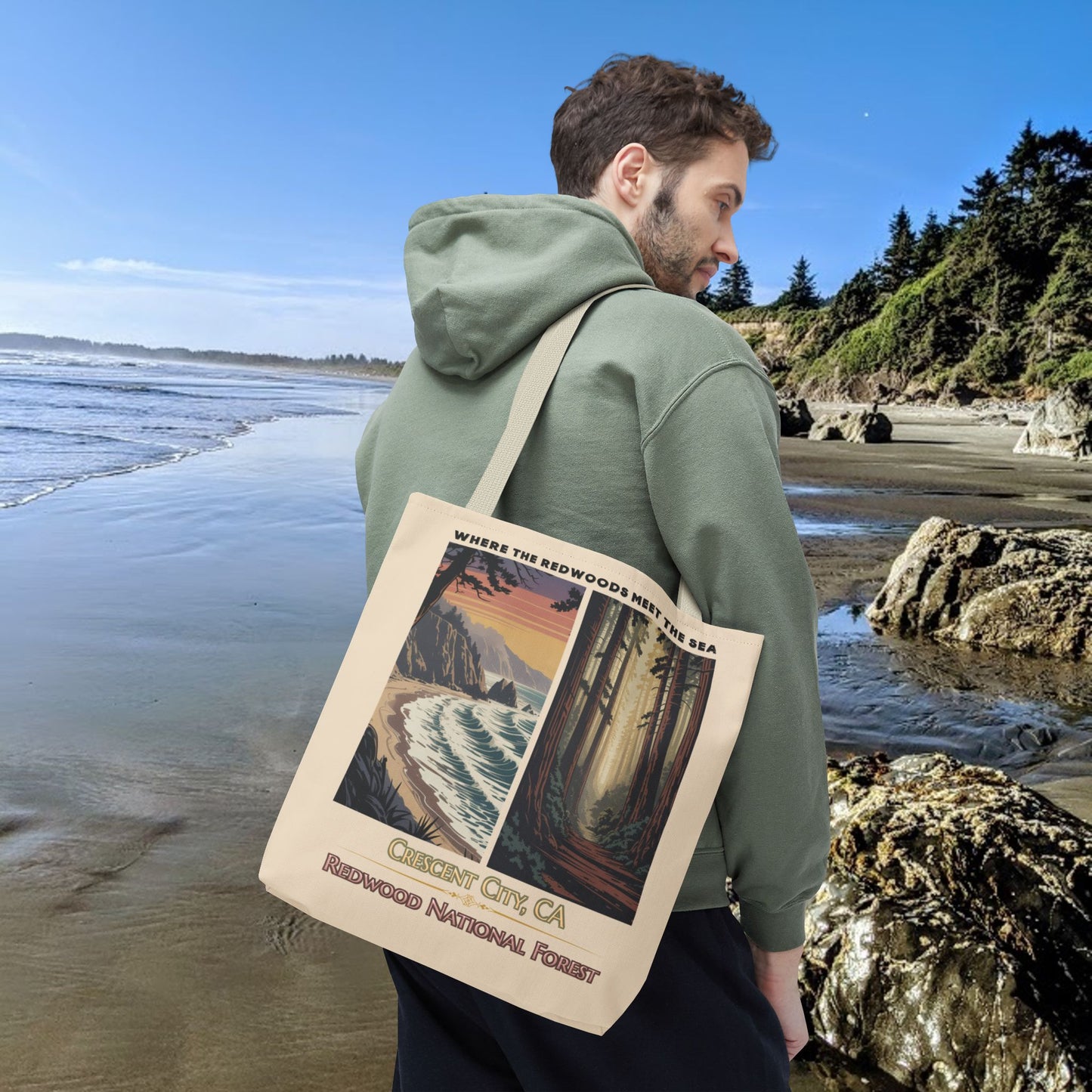 Beige 16" x 16" Tote bag with a double-panel design featuring the redwood forest and the Northern California coastline, with the text “Where the Redwoods Meet the Sea” and “Crescent City, CA Redwood National Forest” underneath.
