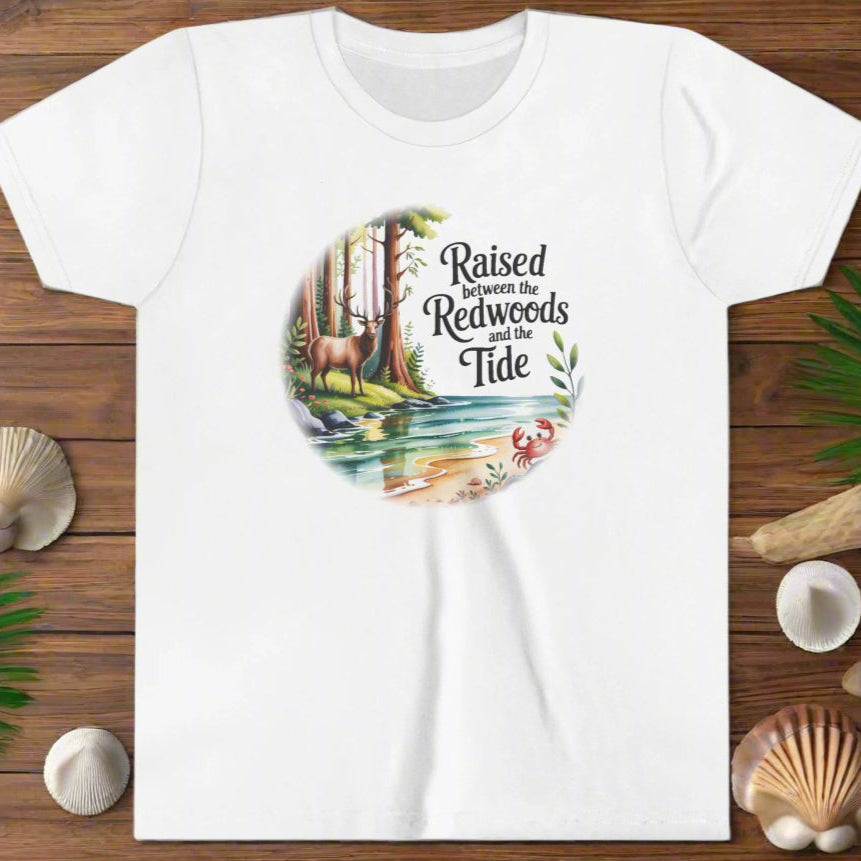 White t-shirt with nature-themed graphic and text on a white background
