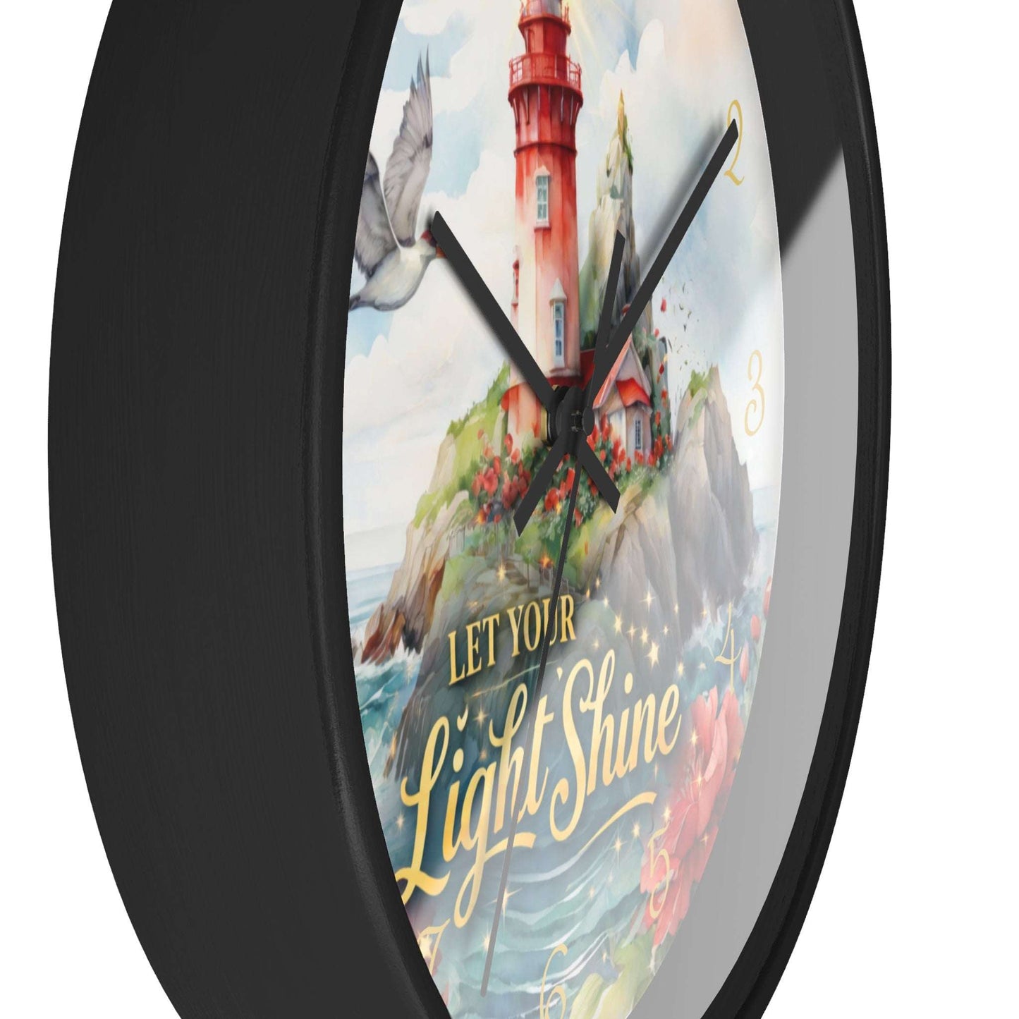 Wall clock with a lighthouse design and 'Let Your Light Shine' text.