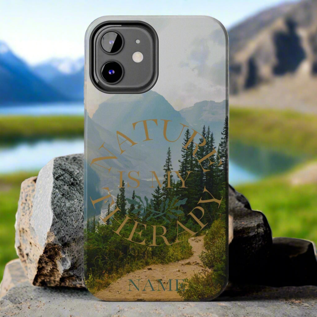 Phone case with nature design and text on a stone surface