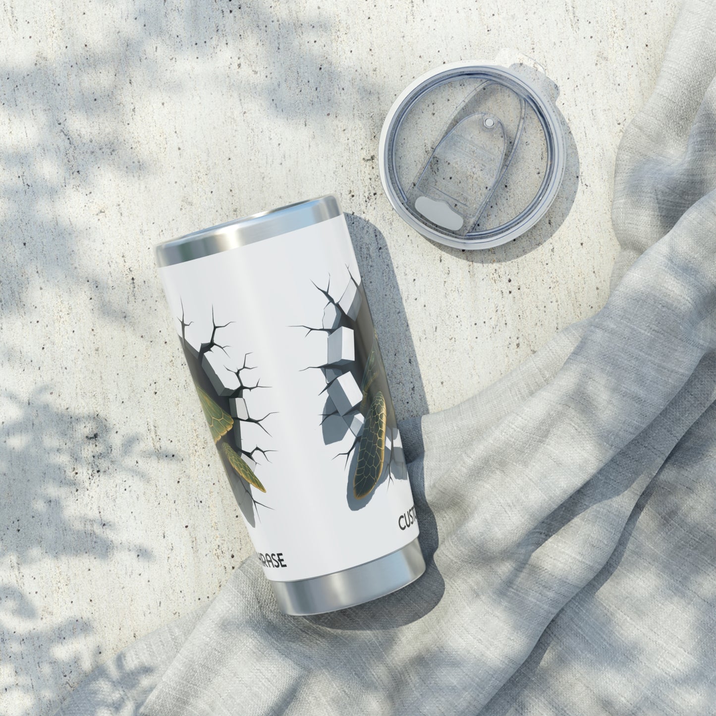 Side view of white tumbler with a breakout design of a sea turtle personalized.