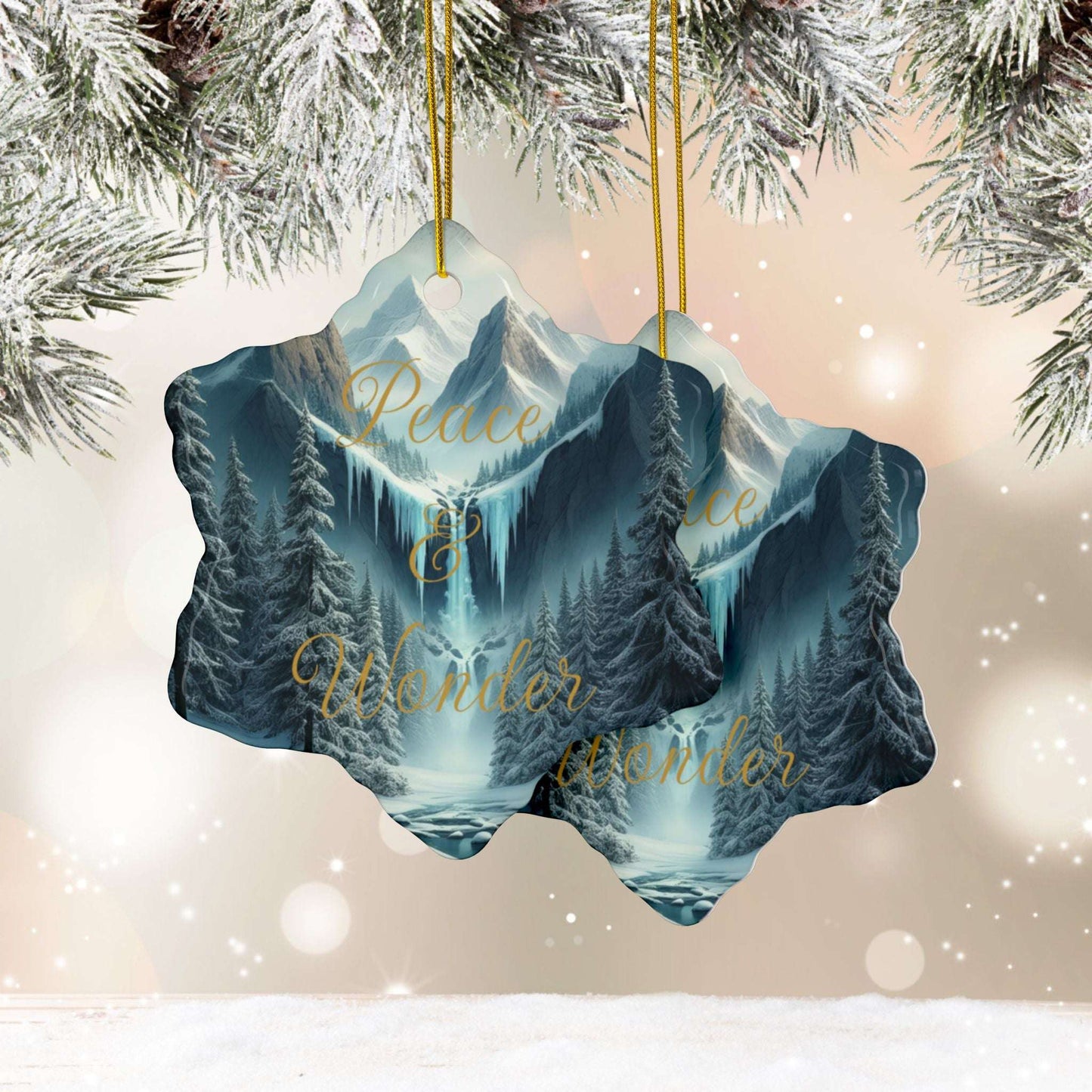Decorative Christmas ornament with mountain and tree design, featuring the text 'Peace & Wonder'.