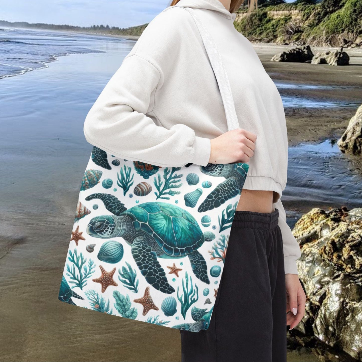 16" x 16" Tote bag with an all-over print of sea turtles and underwater life on a white background with white straps.