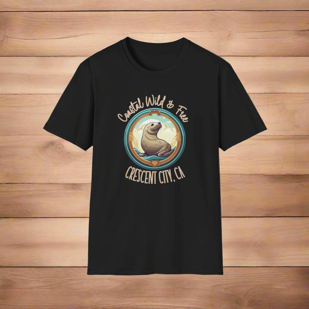 Black t-shirt with a graphic of a seal and text 'Coastal Wild & Free Crescent City, CA' on a white background