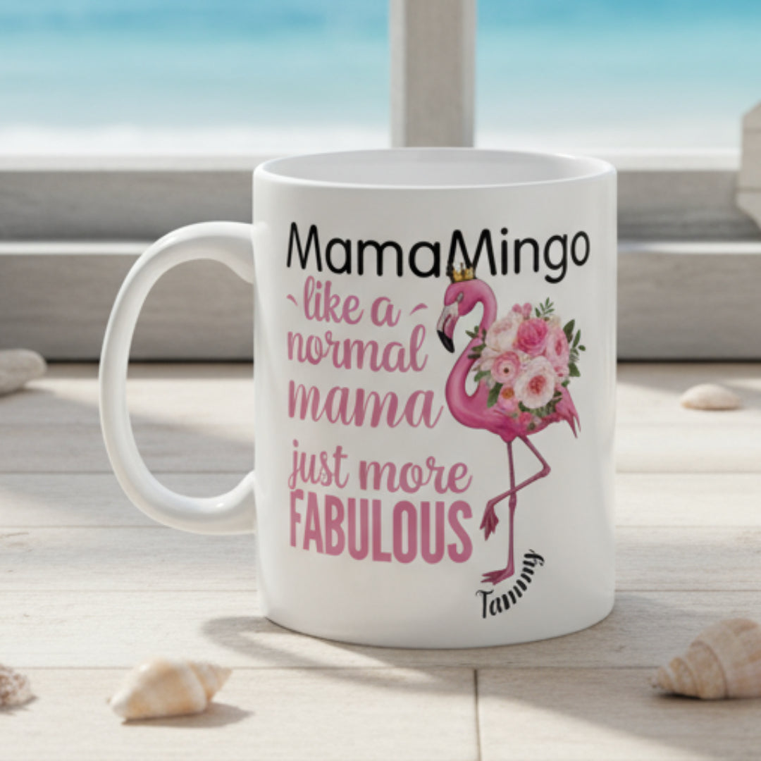 White mug with pink flamingo design and text on a white background
