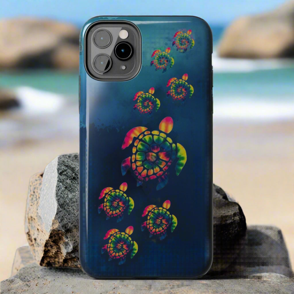 Phone case with colorful turtle design on a blue background