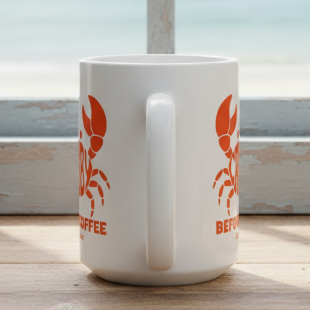 White mug with red crab design and text Crabby Before Coffee and can be personalized.