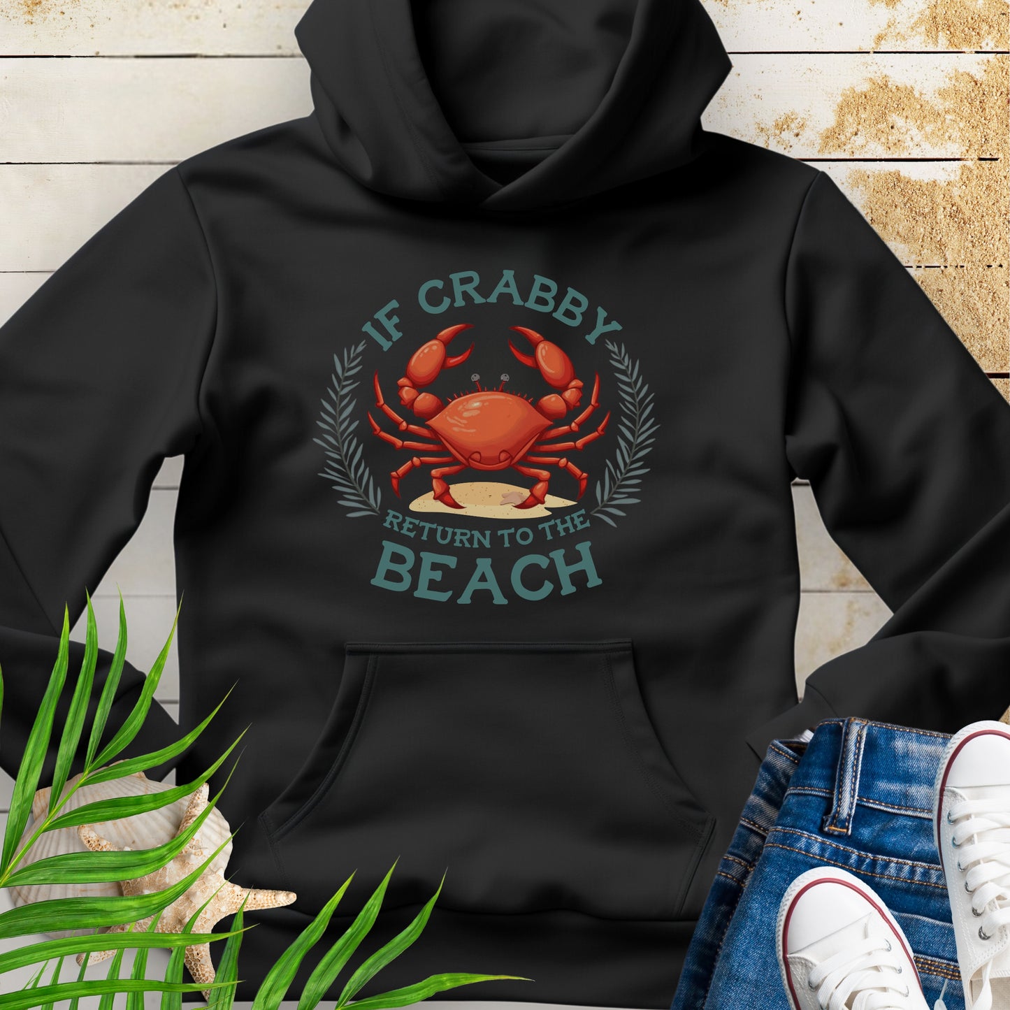 Black Hooded sweatshirt with a playful crab and the phrase “If Crabby Return to the Beach.