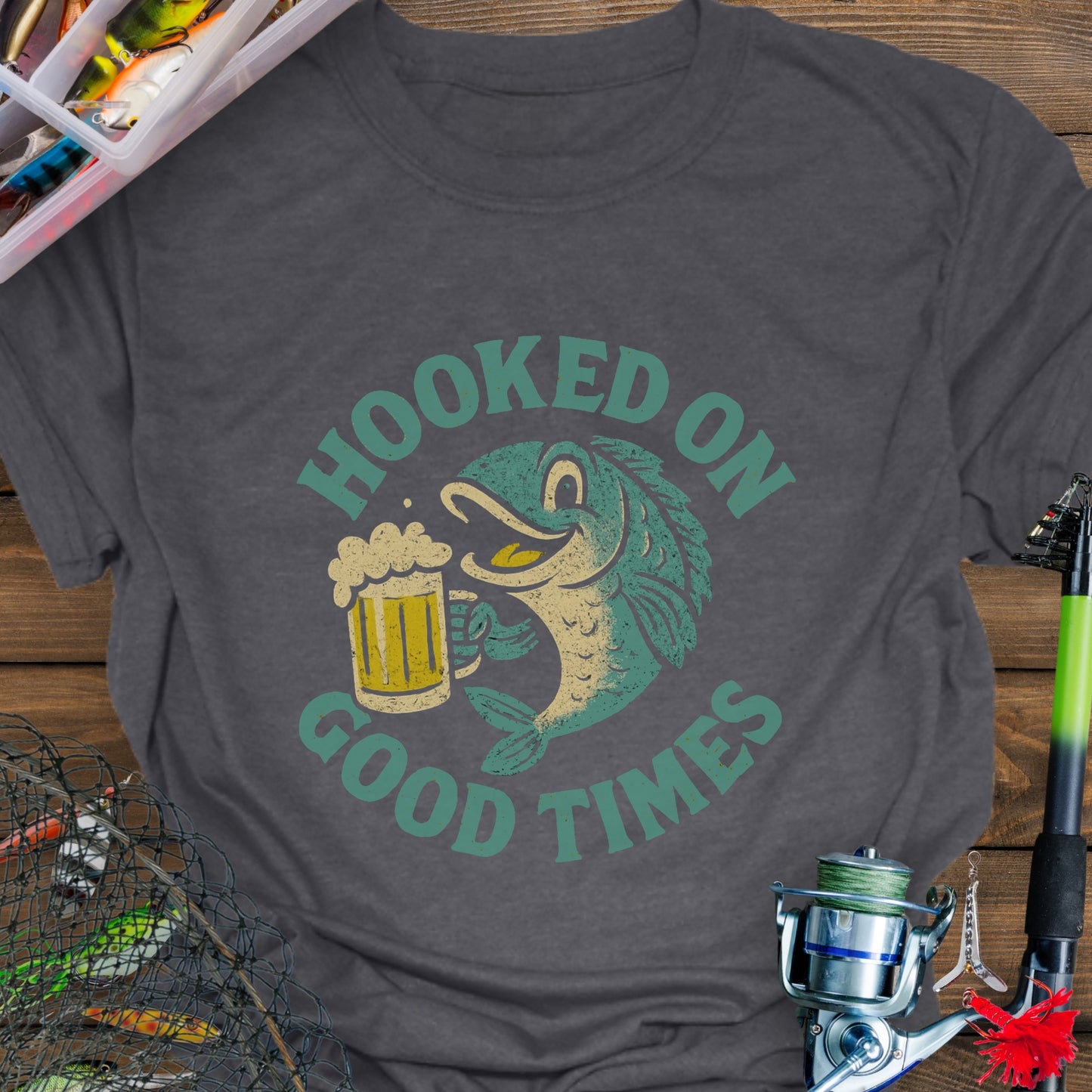 Gray T-shirt with a cartoon fish holding a beer mug and the words "Hooked On Good Times."