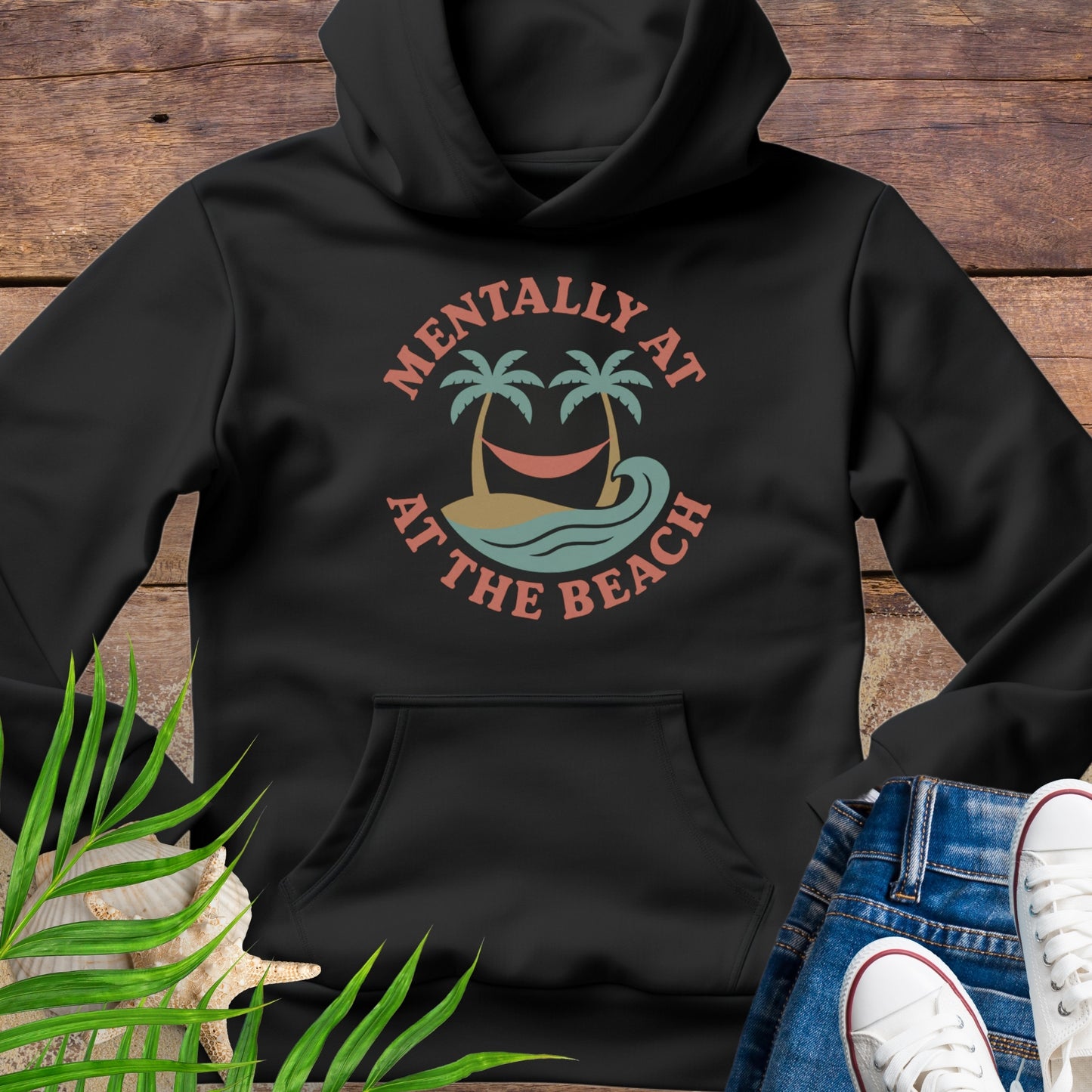 Black hoodie Mentally at the Beach retro with palm trees and hammock design.