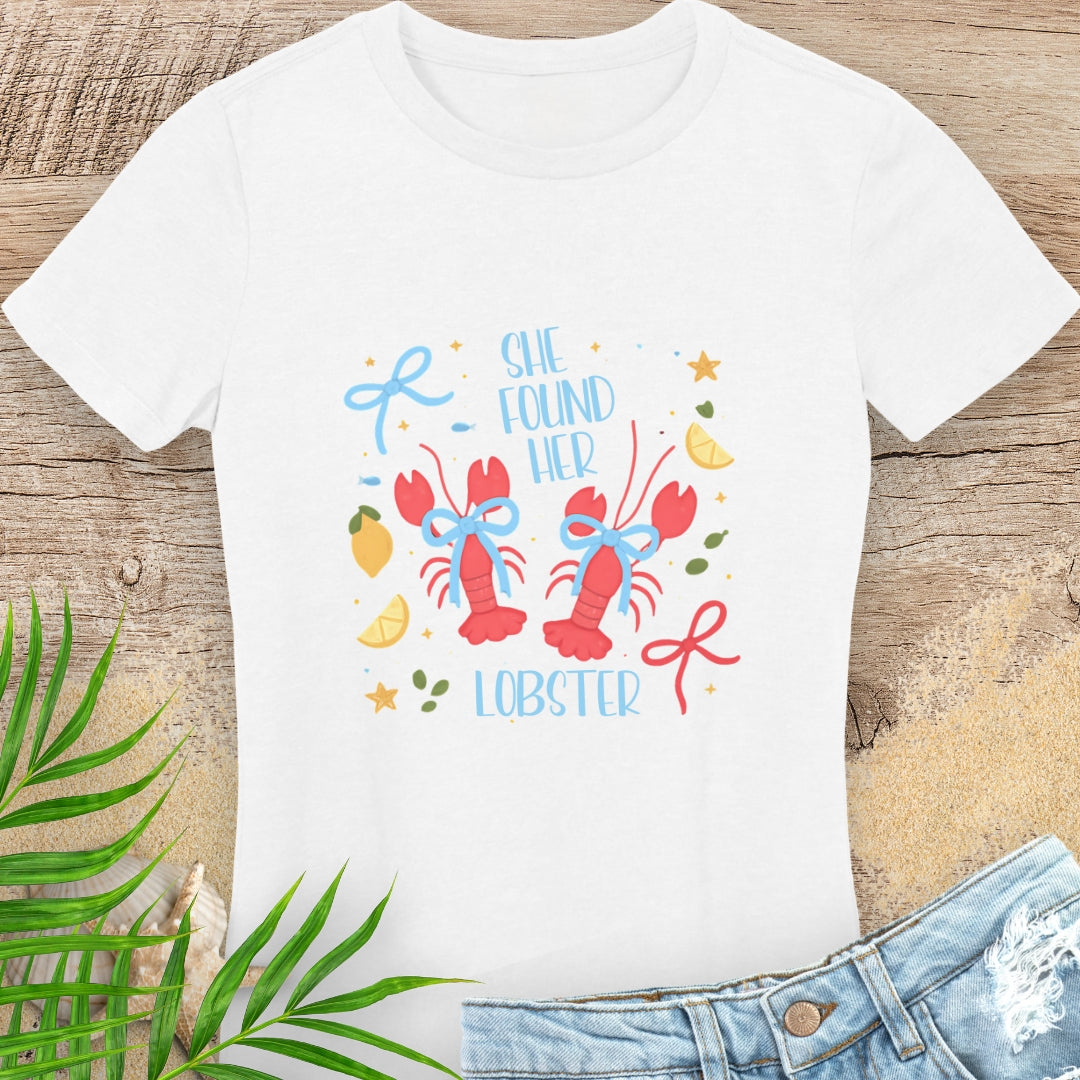 White woman's t-shirt with colorful lobster design and text She Found Her Lobster.