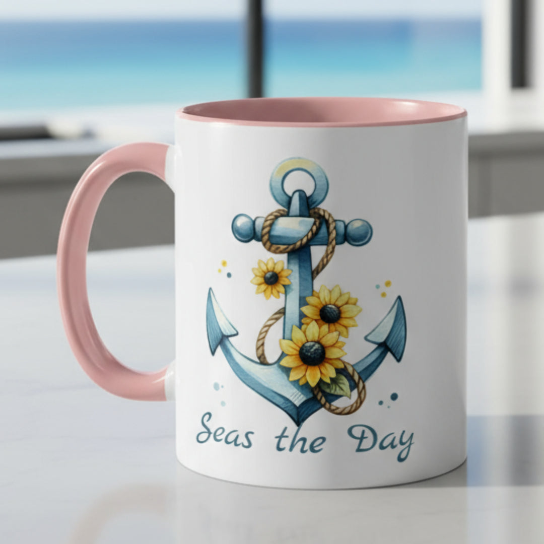 11 oz White mug with pink handle and interior with Anchor and Sunflowers with text Seas the Day