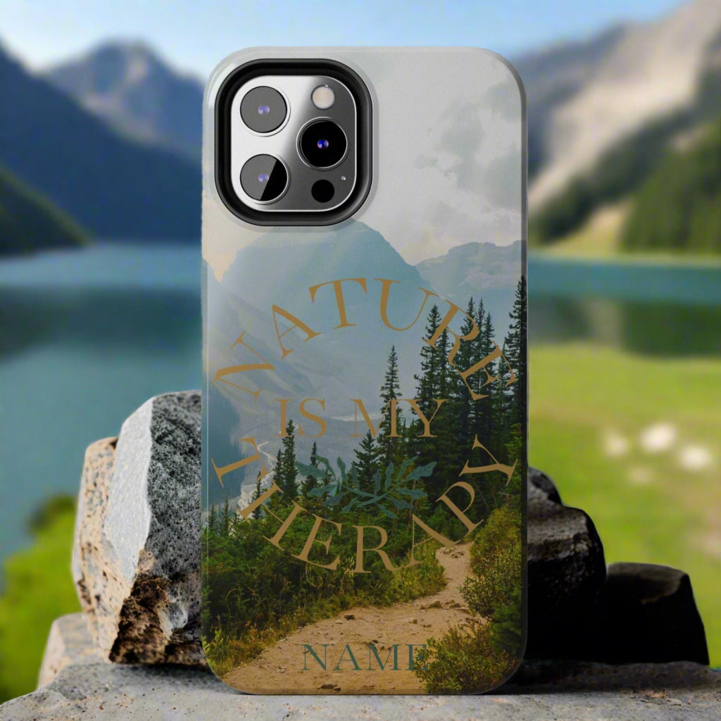 Phone case with nature design and 'Nature is my therapy' text on a gray background