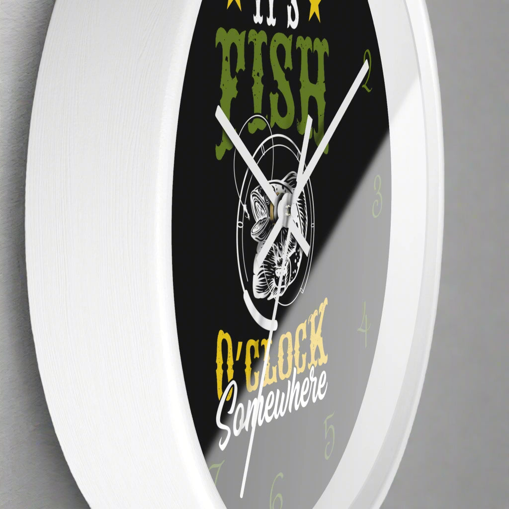 Wall clock with fishing-themed design and text on a black background