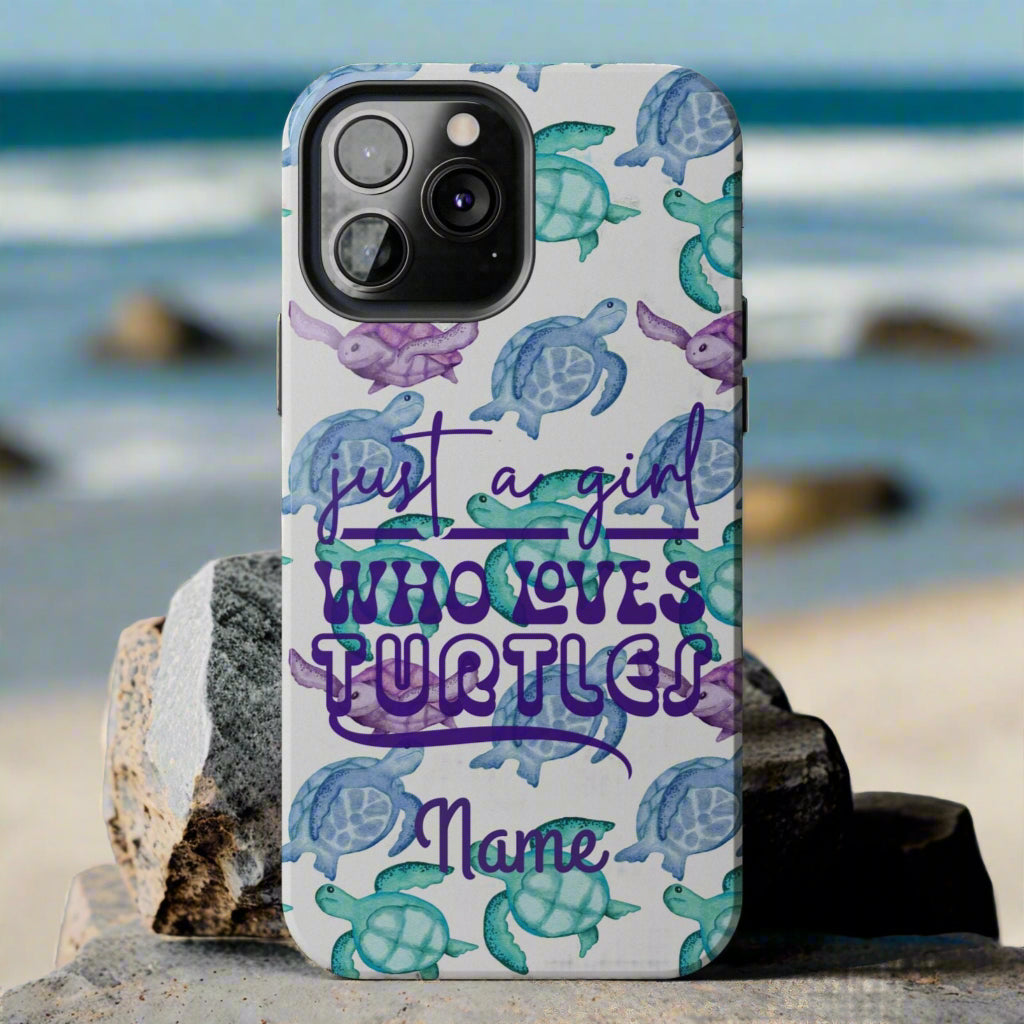 Phone case with sea turtle design and text 'Just a girl who loves turtles' on a gray background
