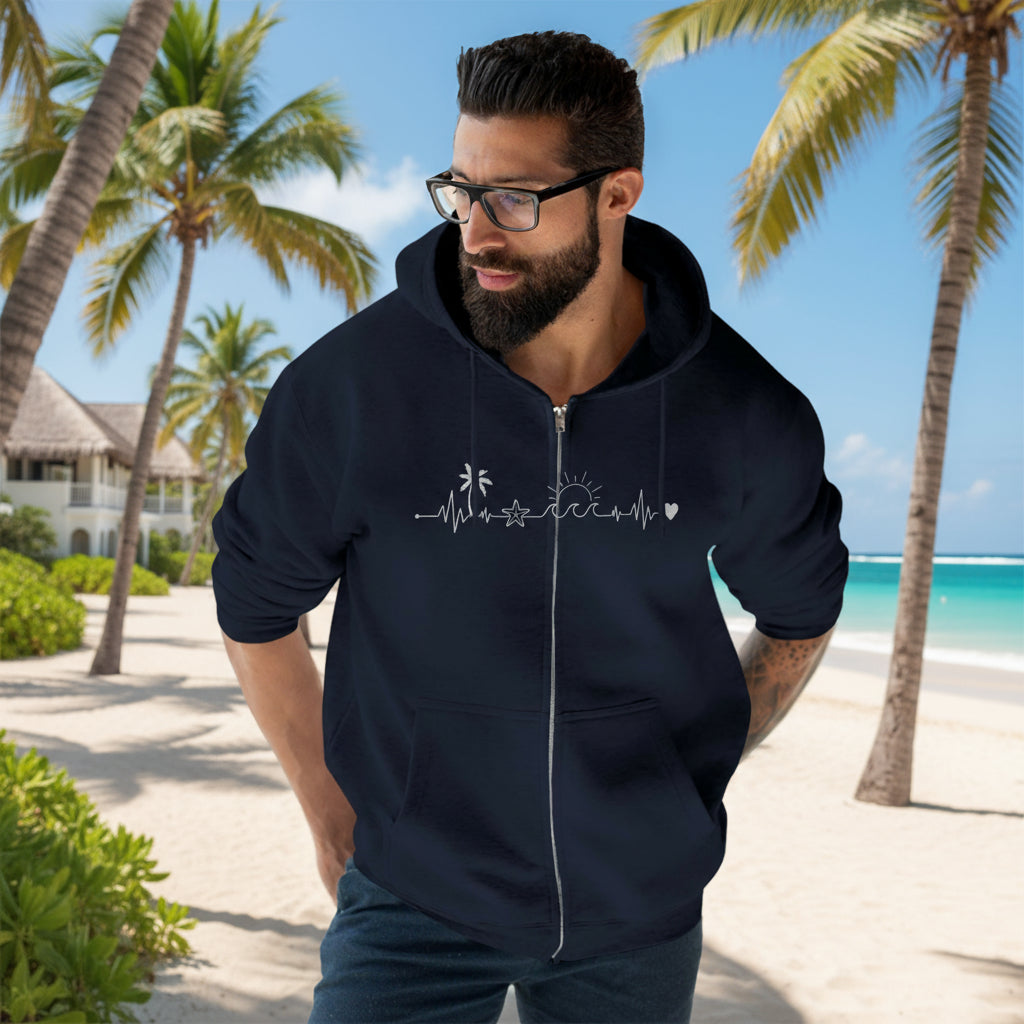 Man wearing a navy blue hoodie with a unique design on a light background