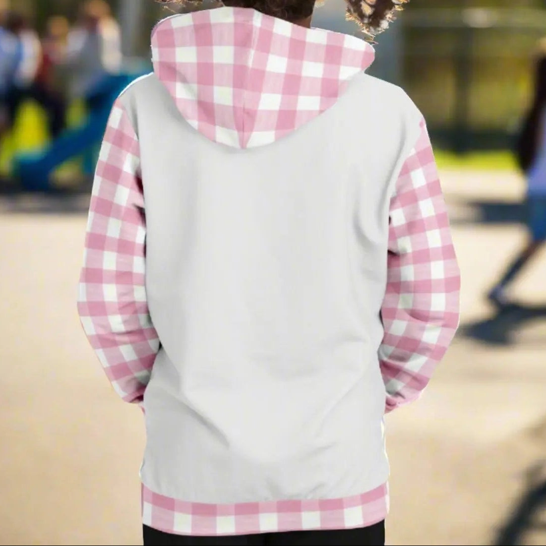 Back of Custom girl's hoodie with white front and back and pink and white gingham sleeves, kangaroo pouch and hoodie that says Living in a Beachy World in fancy font