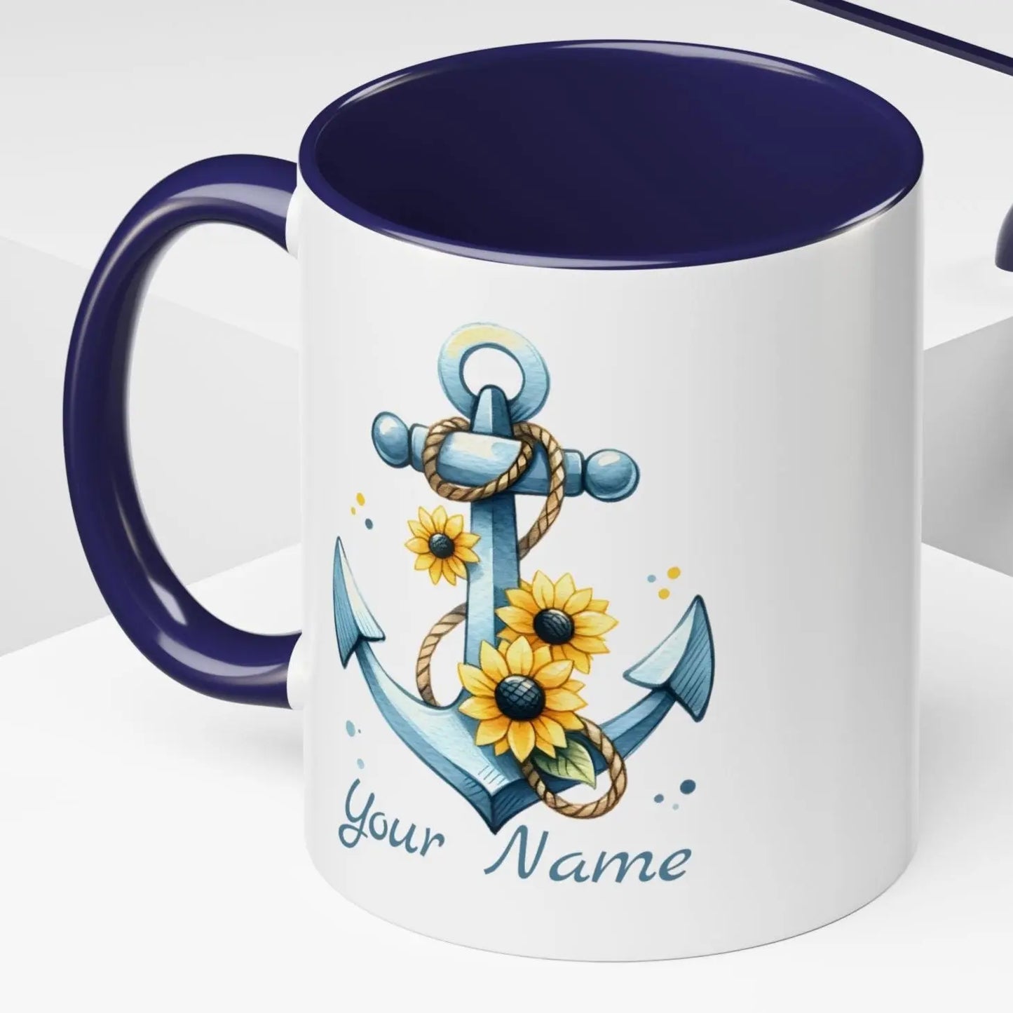 11 oz. White mug with blue handle and interior with Anchor and Sunflowers with text Seas the Day