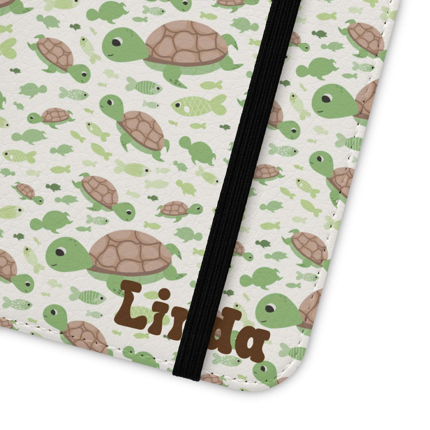 Flip phone case with turtle pattern and personalized name.