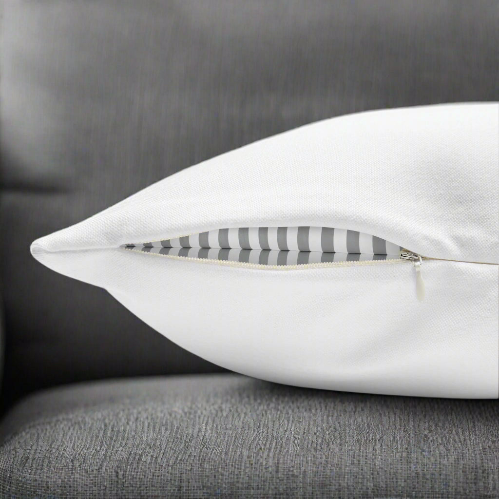 White pillow showing the concealed zipper closure.