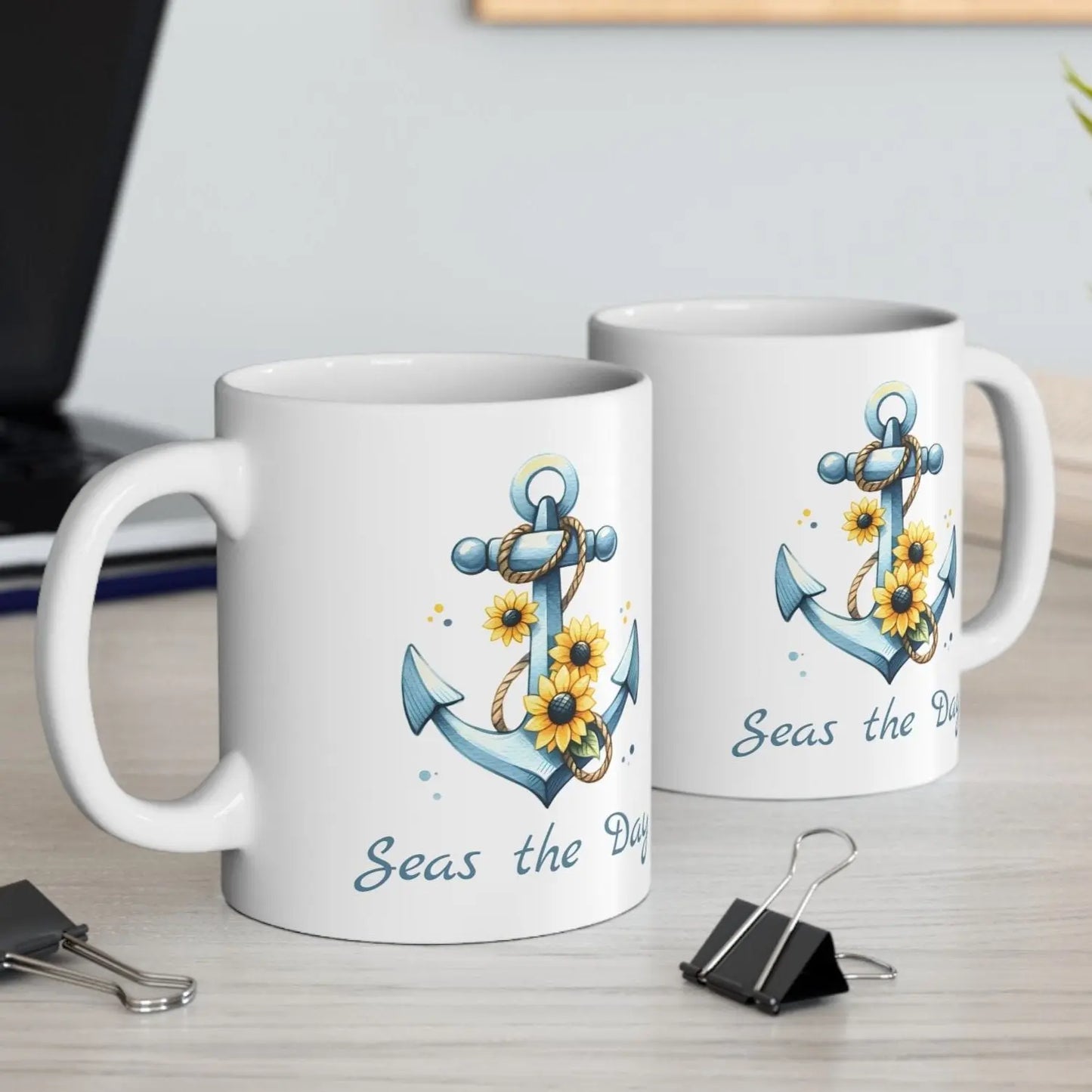 Two 15 oz White mug with Anchor and Sunflowers with text Seas the Day