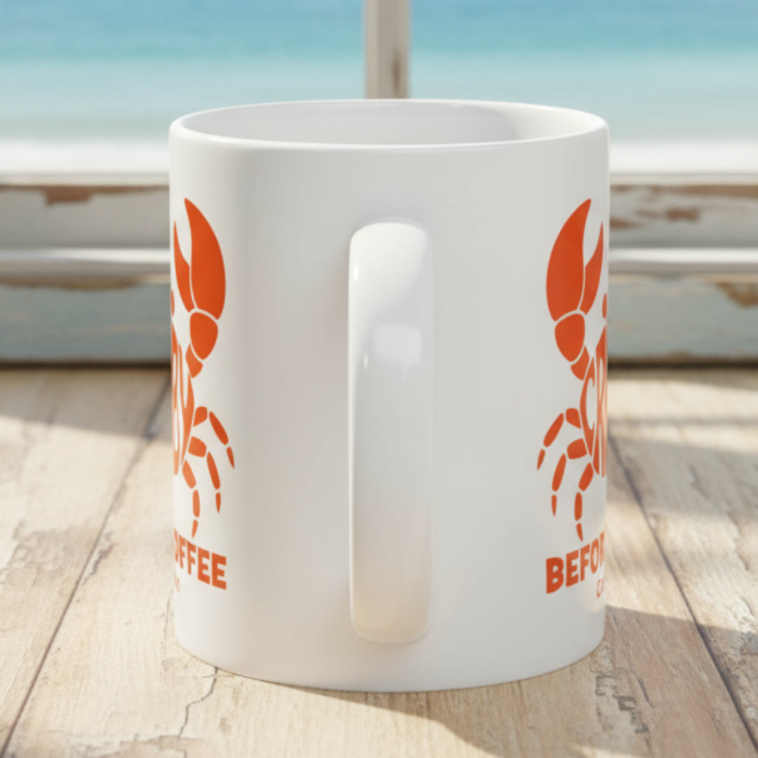 White mug with red crab design with text Crabby Before Coffee and can be personalized.