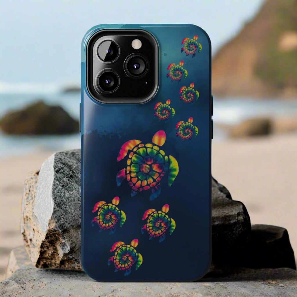 Phone case with tie-dye turtle design on a blue background