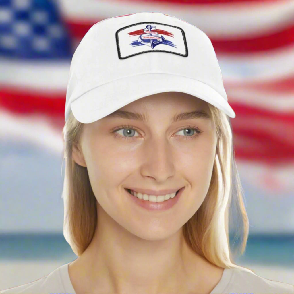 White Curved-bill hat with leather patch featuring an anchor design and the words “Proud American,” perfect for patriotic celebrations and everyday wear.