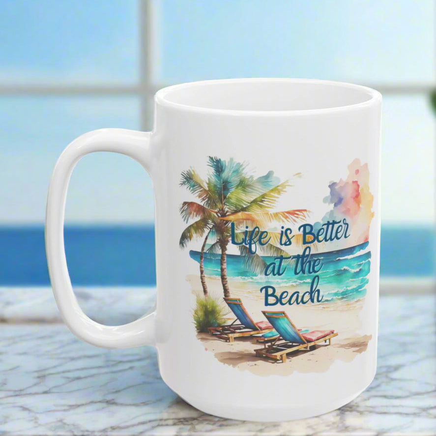 White mug with beach-themed design and 'Life is Better at the Beach' text on a white background