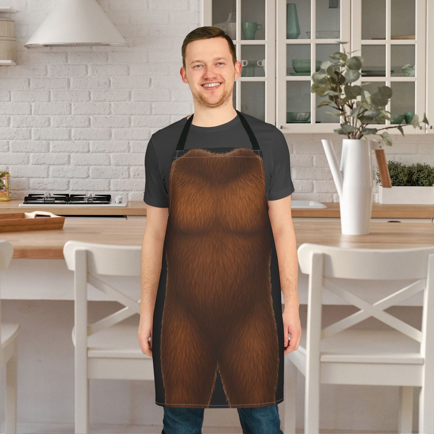 Person wearing a novelty Bigfoot apron with adjustable straps.