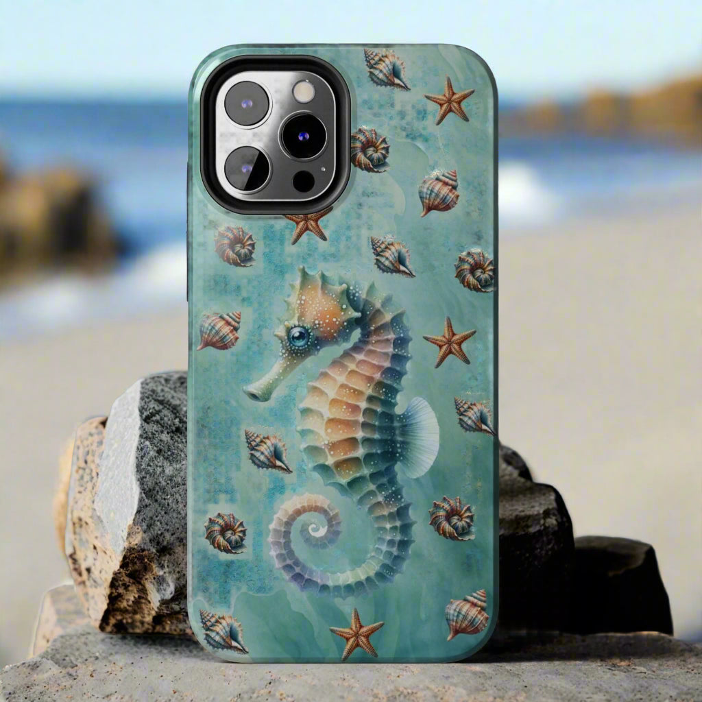 Phone case with seahorse and shell design on a green background