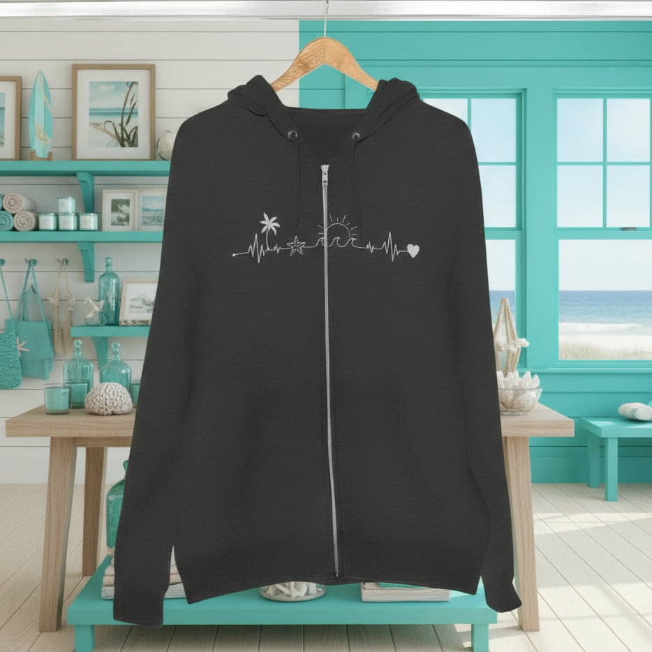 Black hoodie with white graphics and text on a hanger against a white background