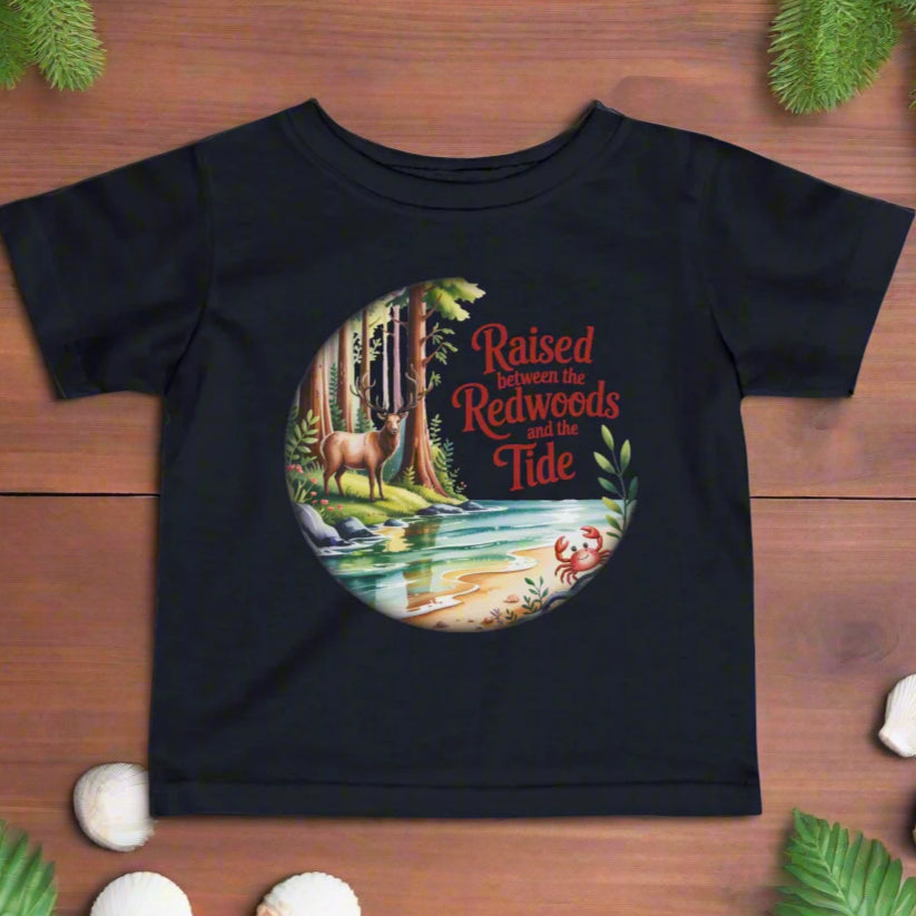 Navy blue t-shirt with a nature-themed graphic and text on a white background