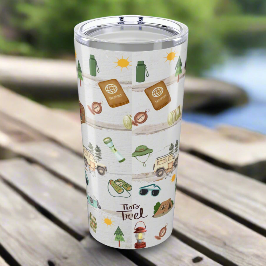 Back view of 20oz stainless steel tumbler with “Life is an Adventure” text and wraparound print featuring tents, compass, trees, sun, lantern, and camping icons.