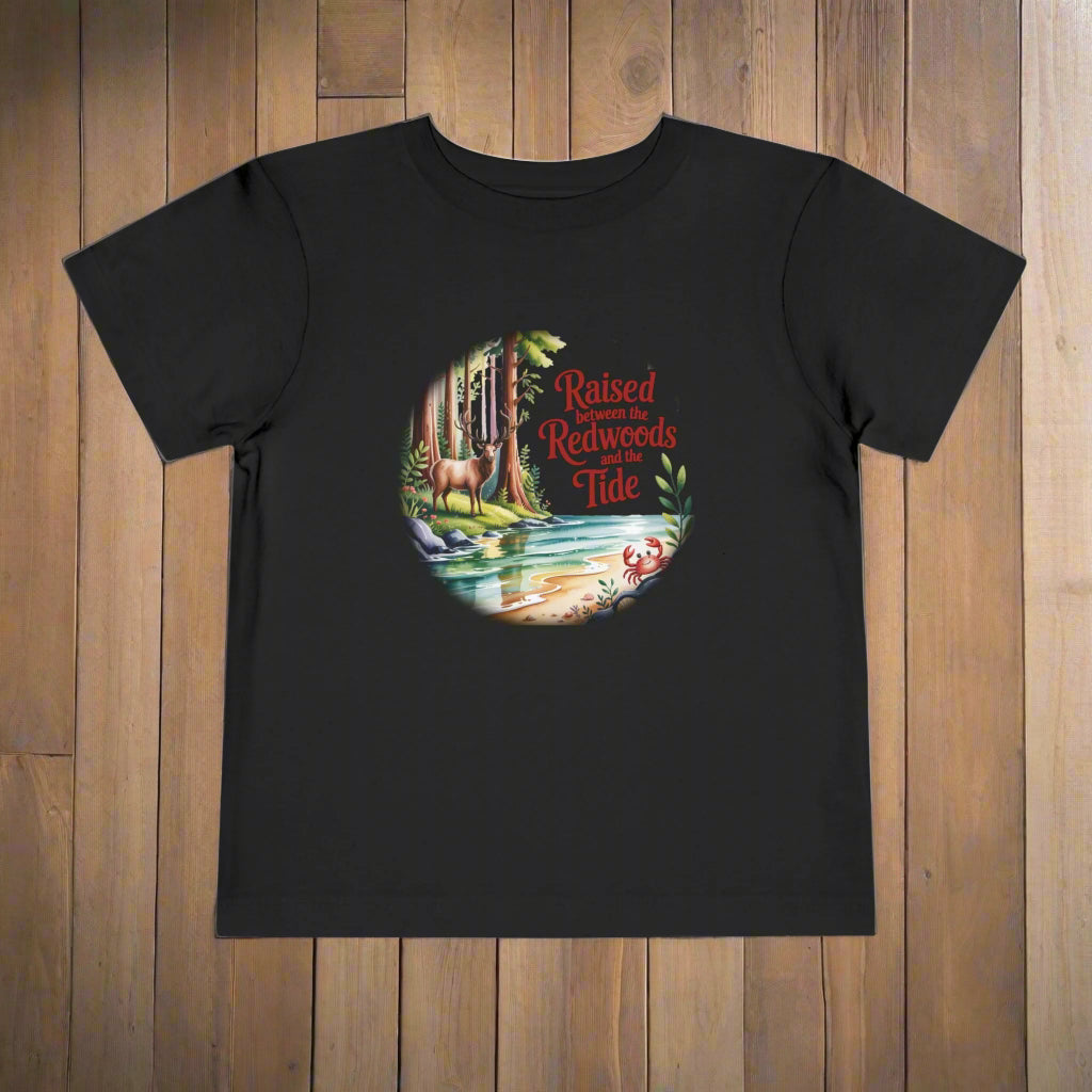 Black t-shirt with a nature-themed graphic and text on a white background