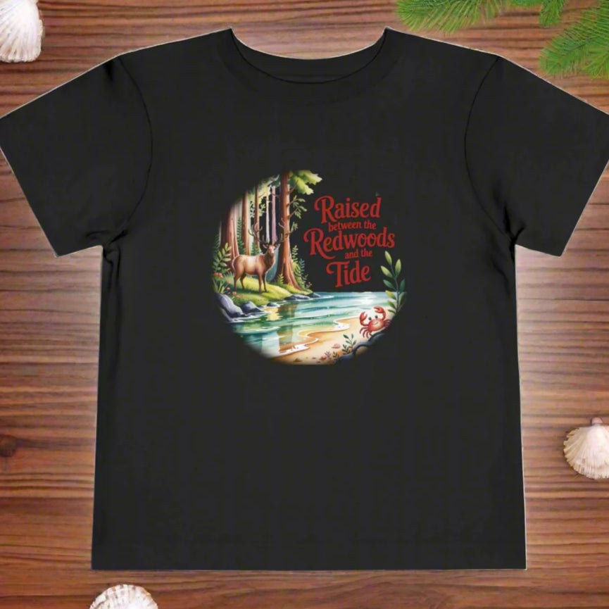 Black t-shirt with a nature-themed graphic and text on a white background