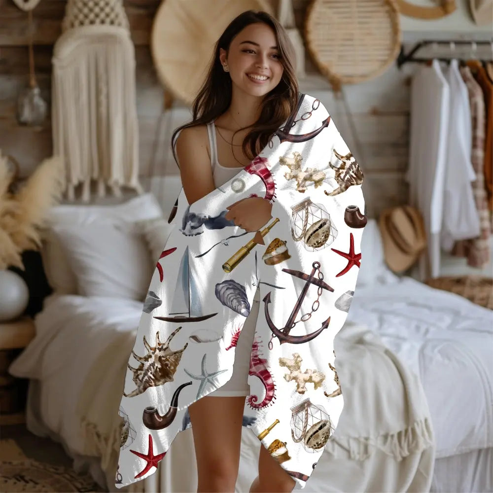 white blanket with nautical graphics 30" x 40"