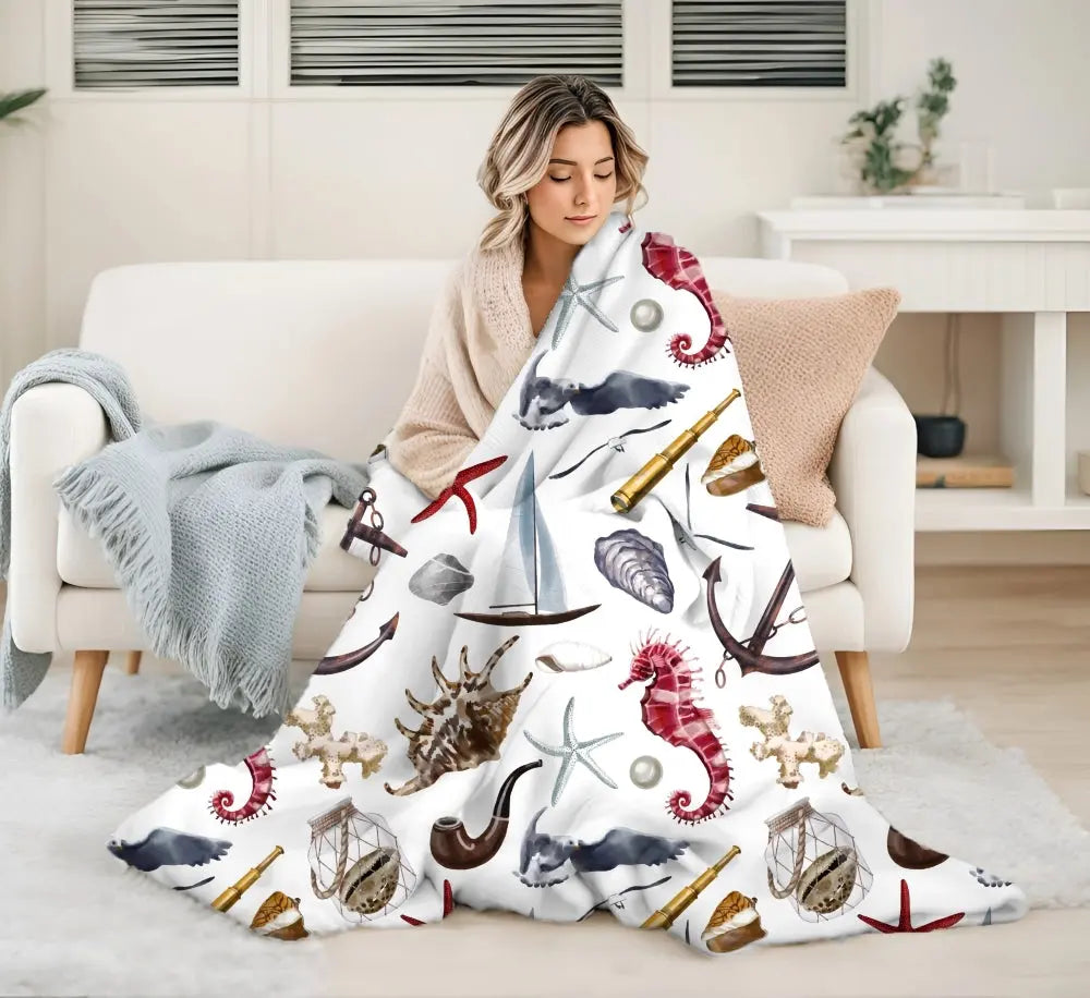 white blanket with nautical graphics 50" x 60"