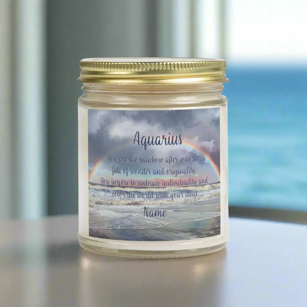 Elegant Scorpio Zodiac hand-poured coconut apricot wax scented candle in a 9 oz clear glass jar with gold lid, featuring a picture of a rainbow over the ocean and an inspirational quote personalized. A beach-inspired astrology gift, perfect for relaxation and decor.
