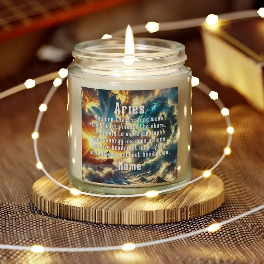 Elegant Cancer Zodiac hand-poured coconut apricot wax scented candle in a 4 oz clear glass jar, featuring a scene of crashing waves with a man in the distance on a rock with the bright sun shining off of the waves and an inspirational quote personalized. A beach-inspired astrology gift, perfect for relaxation and decor.