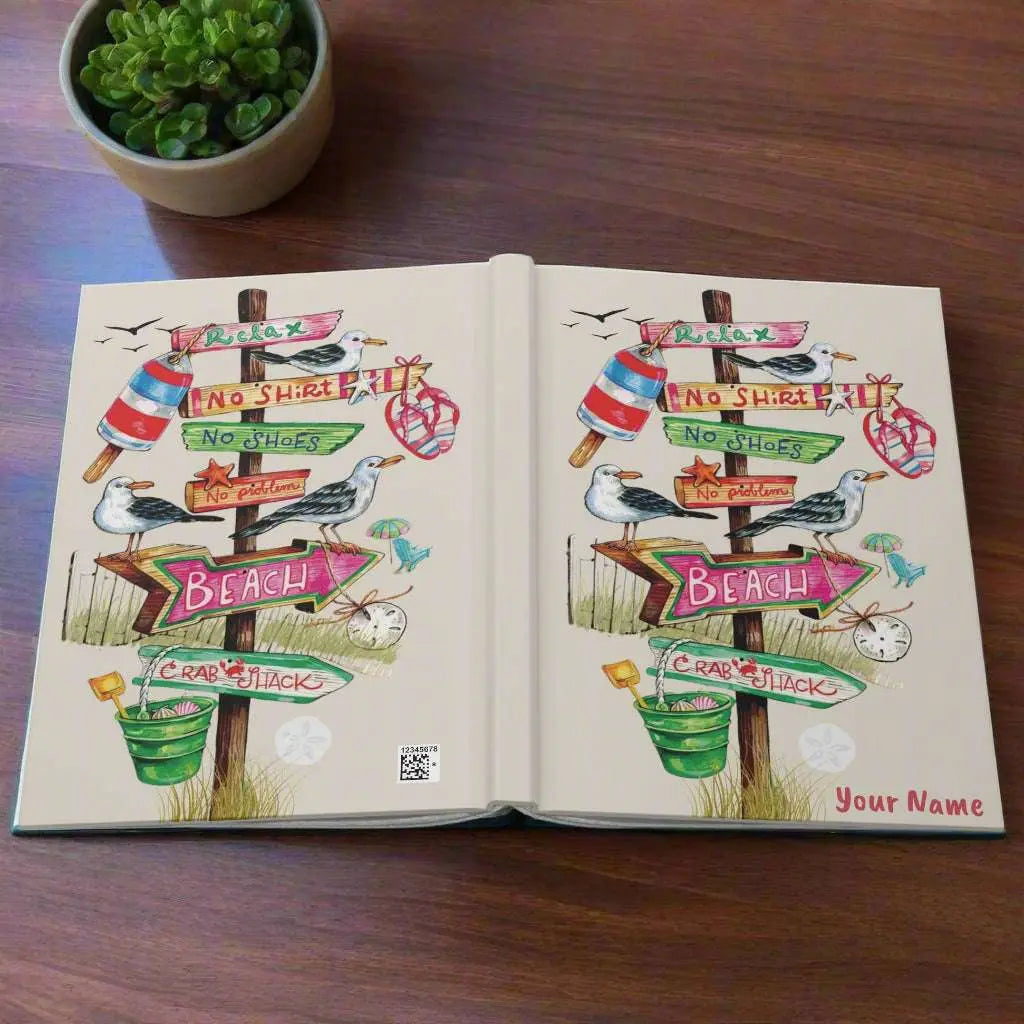 Personalized beach-themed hardcover journal featuring a beach-themed design with a direction wood sign with flip flops, sand bucket, and other beach items hanging off them, personalized with your name.