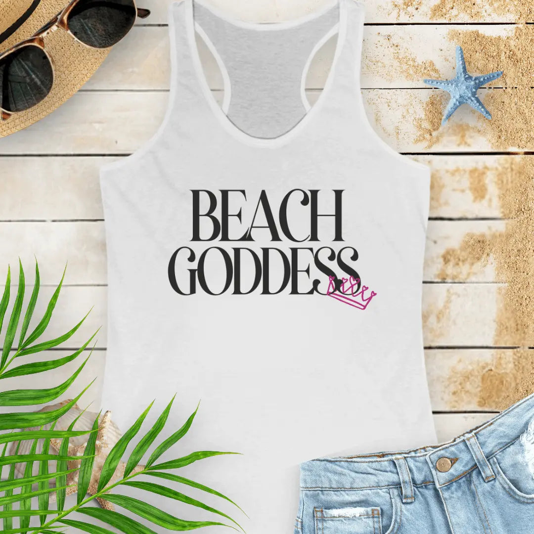 White Racerback Tank Top with the text Beach Goddess with a crown hanging off of the bottom of the text -stylish tank is great for vacations, beach days, or casual wear.