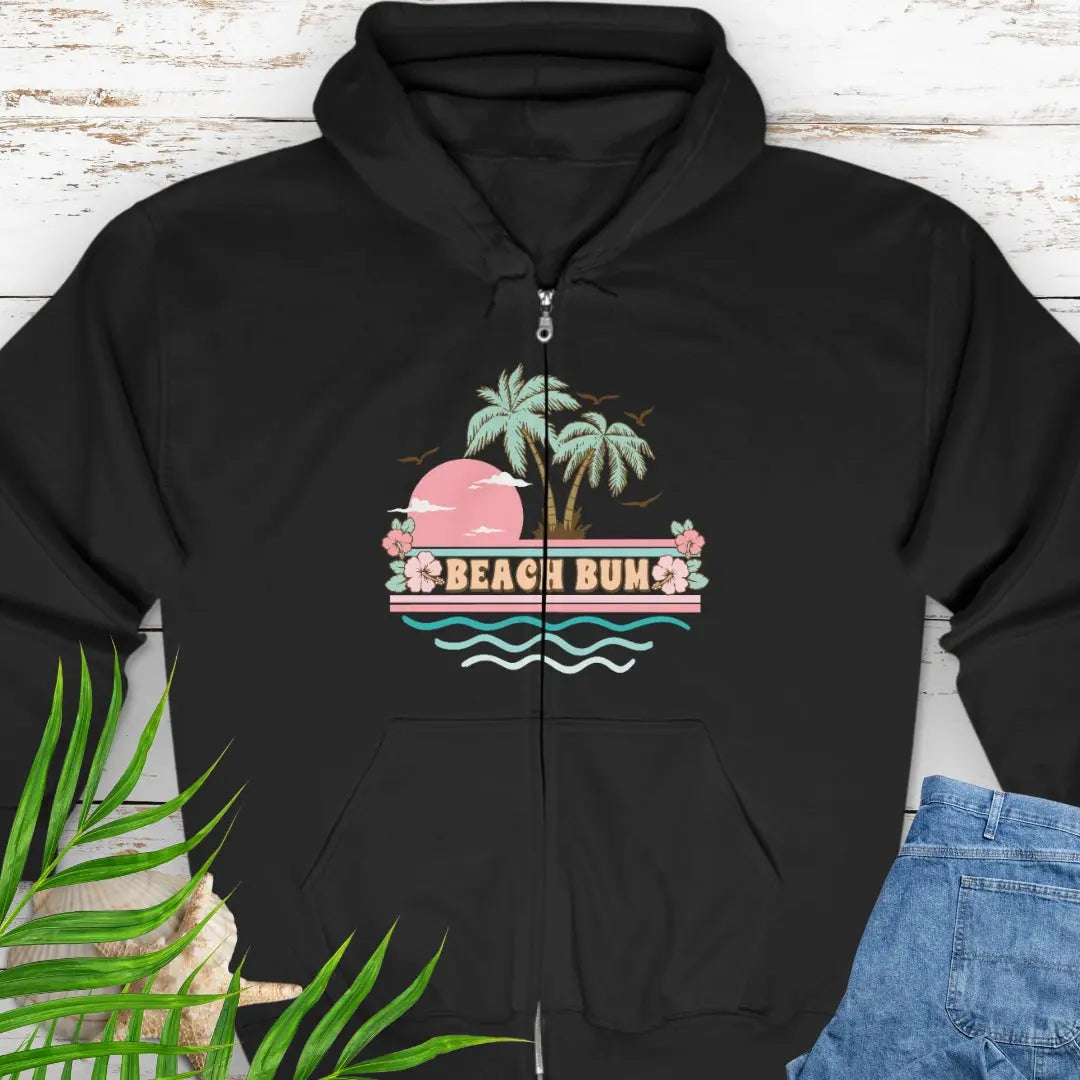 A pastel retro beach scene that says Beach Bum Black zippered sweatshirt with hood.