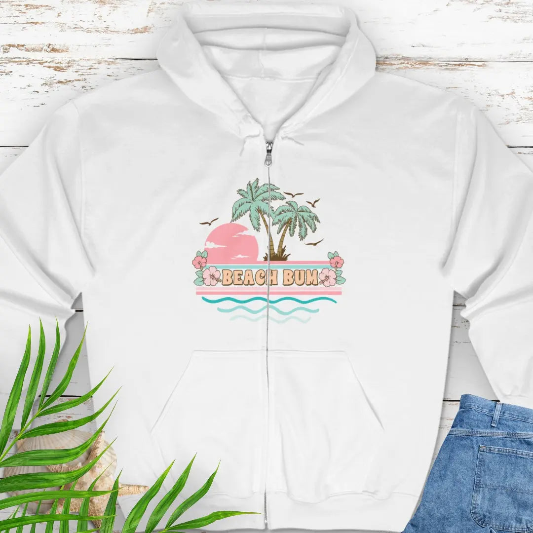 A pastel retro beach scene that says Beach Bum White zippered sweatshirt with hood.