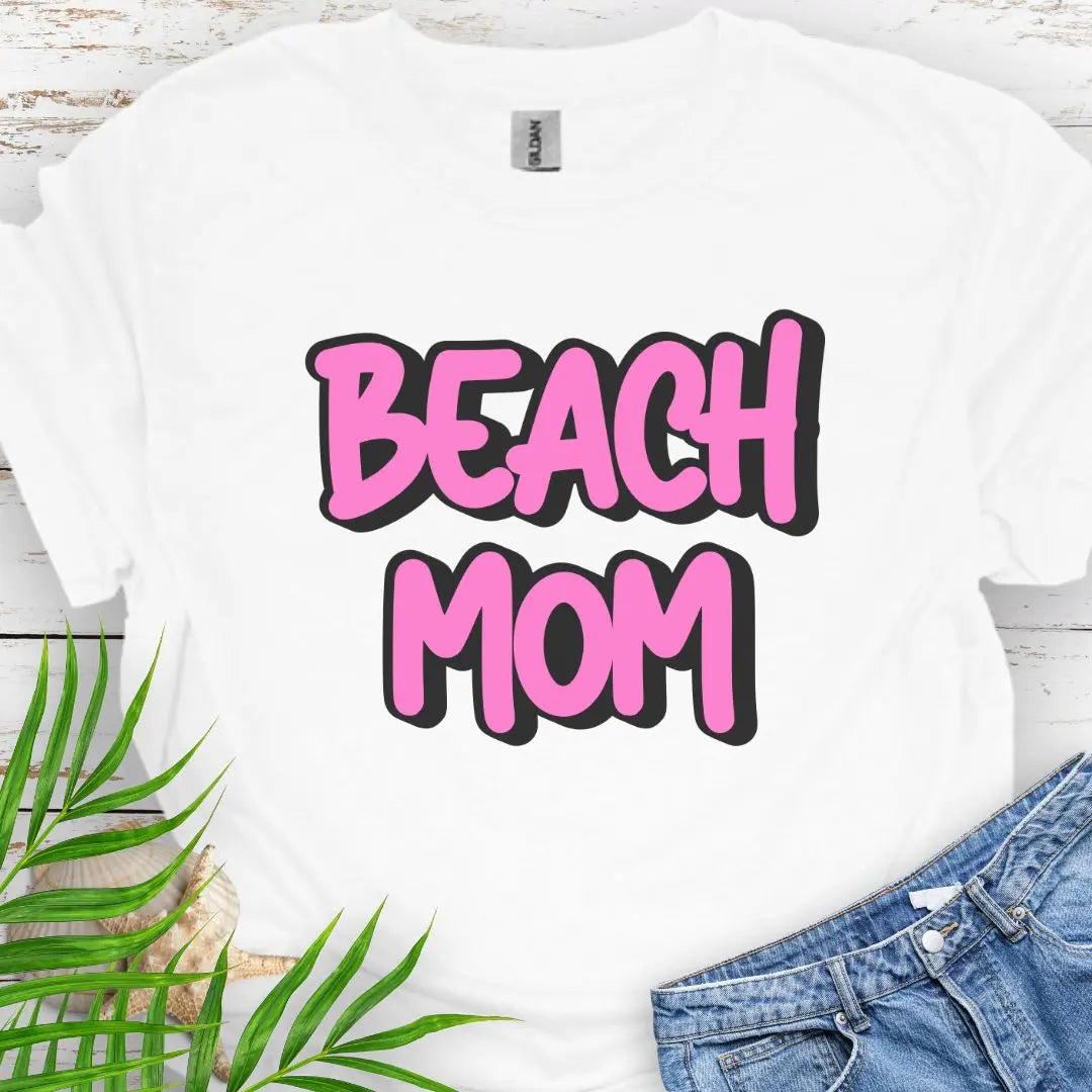 Beach Mom in retro bright pink text with white shadow on a white tee.