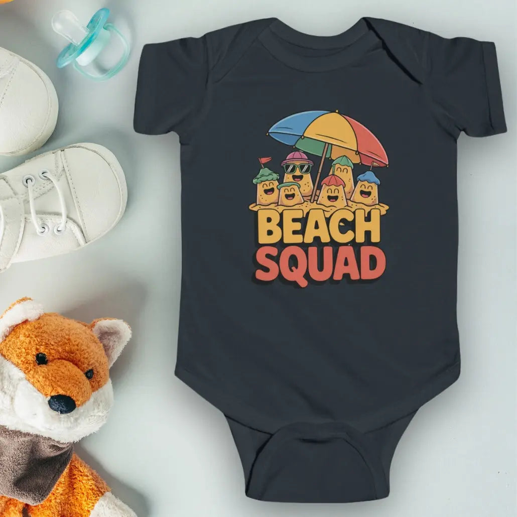 Black 'Beach Squad' Infant Bodysuit featuring a playful design of sand castle people under a big beach umbrella.