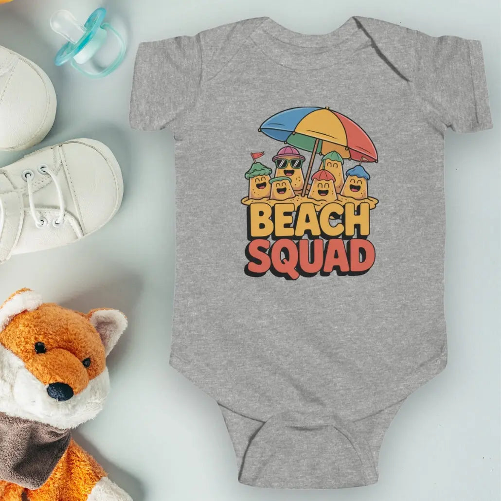Heather Gray 'Beach Squad' Infant Bodysuit featuring a playful design of sand castle people under a big beach umbrella.
