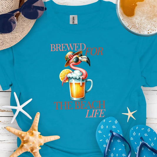 Tropical Blue t-shirt with cocktail and flamingo that says Brewed for the Beach Life.