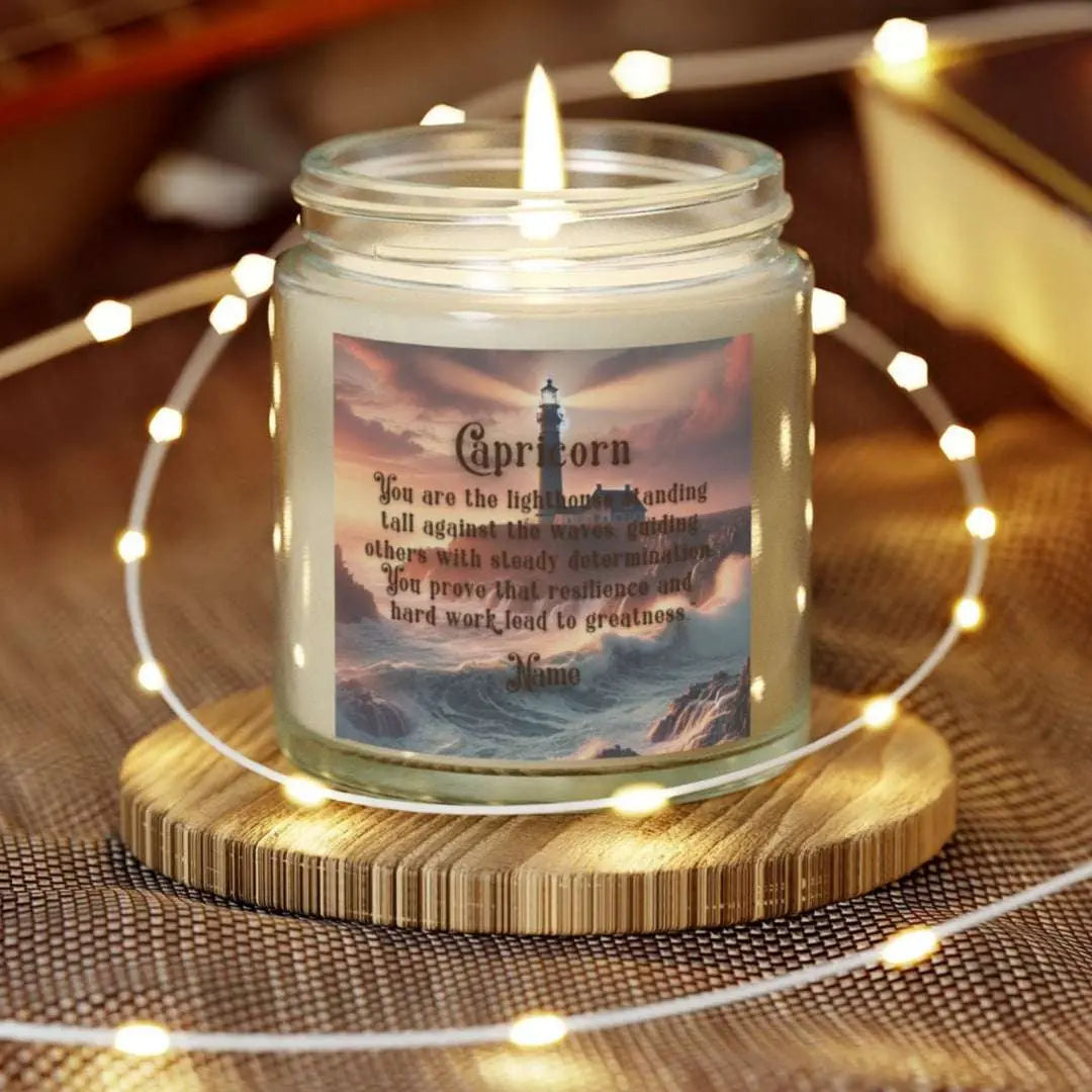Elegant Capricorn Zodiac hand-poured coconut apricot wax scented candle in a 4 oz clear glass jar, featuring a picture of crashing waves onto a lighthouse with an inspirational quote personalized. A beach-inspired astrology gift, perfect for relaxation and decor.